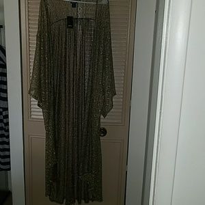 A golden crochet duster